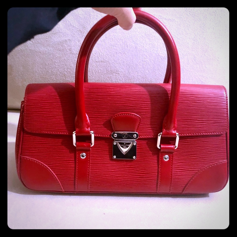 Louis Vuitton Pochette Segur Epi Leather Handbag
